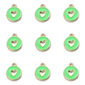 Set of nine light green enamel heart charms with gold plated edges in 3x3 grid layout - Round Hollow Heart Style / Grass Green