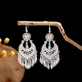 Ethnic bohemian silver tassel earrings with hollow leaf design and long metal fringes - Heart Hollow Moon Tassel Silver Style (E2871-9)