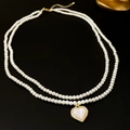 Close-up of double-layer faux pearl necklace with gold-framed white heart pendant - 8# Necklace - White Heart Pearl