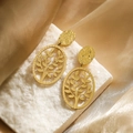 Gold-plated tree of life leaf earrings on white stone and luxury silk backdrop - Tree of Life Hollow Out / Gold