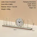 Golden iron art desk clock featuring Welcome lettering and wooden base ornament - Gold WELCOME
