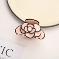 Close-up of pink camellia hair claw with black trim edges and glossy resin petals - 7.5cm / Pink Camellia