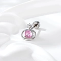 Elegant silver Saturn earring with pink zircon, macro view on white fabric background - Single Piece / Pink