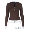 Macro view of ribbed knit texture and white buttons on a brown long sleeve top - XS / Brown