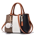 Three-color patchwork tote bag in brown and white with decorative plush ball charm - Caramel color