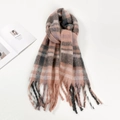 Close-up of thick plaid mohair scarf with pink and grey stripes and long tassels - Pink