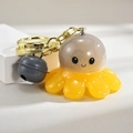 Cartoon octopus keychain with LED light, gray translucent head, and yellow tentacles - Bell Style [Grey]
