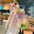 Pink Capybara keychain featuring a liquid car-shaped sand charm and silicone strap - Capybara Bus - Green