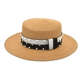 Close-up of straw boater hat featuring black ribbon with white pearls and rhinestones - Camel