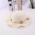 Beige woven straw sun hat for girls featuring a wavy brim and pink flower decoration - S (50-52cm) / Milky White-Hat