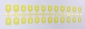 Detail view of 24 pieces short square lemon yellow glossy press-on nails on the mold - Lemon Yellow (DFYL-14)