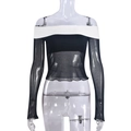 Dettaglio del top a spalle scoperte con maniche in rete nera e scollatura elastica bianca - S / Zebra Bianco e Nero
