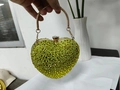 Elegant heart-shaped evening bag in light lime green finish with sparkling rhinestones - 14cmx6cmx13cm / Yellow