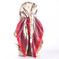 Satin silk scarf featuring gold chain patterns and a red border on a model's head - 90*90cm / Coin Red