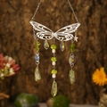 Silver metal butterfly suncatcher with green mushroom beads and hanging crystals - Silver Wings + Peridot Green Chips