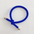 Navy blue braided elastic hair tie with golden cylindrical metal alloy buckles - Blue