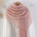 Pink cotton linen scarf with pleated texture and fringe edges on a wooden hanger - Pink