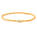 Handmade orange seed bead bracelet with polished gold-tone metal accents and charms - Orange
