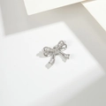 Elegant silver bow pendant with shimmering rhinestones and small white pearls - Pearl Rhinestone Bow (PJ0047) / Silver