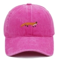 Detailed close-up of fox embroidery on pink washed cotton baseball cap texture - Rose Red