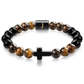 Detailed shot of tiger eye beads bracelet featuring a black cross and letter J charm - Letter J