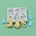 6-cavity Christmas silicone mold featuring tree, sock and bell shapes for DIY baking crafts - 6-Cavity Christmas Elements