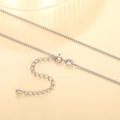 Macro detail of S925 sterling silver O-chain with spring clasp and teardrop extension - XL1188 Diamond Cut Cross Chain