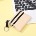 Petit porte-monnaie beige en tissu à trois fermetures éclair et porte-clés métal - Blanc Cassé