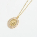 Detailed view of gold oval Virgin Mary pendant with baguette-cut cubic zirconia frame - Gold White Zirconia XL4074-1
