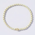 Minimalist elastic bracelet with gold beads and green iridescent translucent beads - Pale Green and Gold