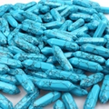 Pile of hexagonal blue turquoise crystal points with natural black webbed textures - Blue Turquoise