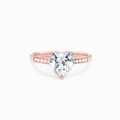 Detail of rose gold ring with heart-cut pink zircon and side accent diamonds - US Size 6 / Rose Gold (White Zircon)