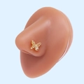 Macro shot of gold butterfly nose stud with cubic zirconia on silicone model - Gold Butterfly White Zirconia (#19)