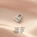 Macro shot of 10x7mm stainless steel Love lock pendant showing dimensions and polished finish - Steel