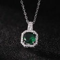 Macro shot of an emerald-style octagon zircon pendant necklace with diamond accents - Emerald Green Pendant Only (Without Chain)