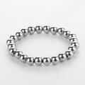 Minimalist silver stainless steel bracelet featuring polished round beads and a sleek finish - 7mm Round Beads / Steel