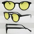 Retro-Sonnenbrille mit rundem schwarzem Rahmen und gelben Ozeangläsern und Metallnieten - Schwarzer Rahmen Gelbe Gläser