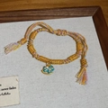 Detail of colorful woven rope bracelet with gold beads and enamel rocking horse charm - 5# Bracelet-Gold-Multicolor (Enamel Horse)