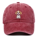 Close-up of embroidered cartoon puppy on a maroon washed cotton baseball cap - Burgundy