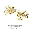Macro detail of gold bow pendant with zircon inlays and precise measurements - Bow (2)