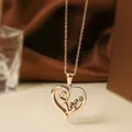 Rose gold titanium steel heart necklace with Love engraving and zircon accents - Rose Gold Heart Necklace N0453R