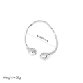 Detailed view of silver textured open bangle showing 60mm diameter and 38g weight info - Solid Hammered / Silver