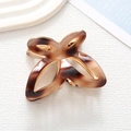 Detailed view of butterfly hair claw clip with tortoise shell pattern and gold metal frame - Dark Brown Beige Tortoiseshell (7)