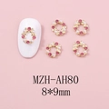 Makroansicht der Weihnachtskranz-Nagelanhänger mit rosa Strasssteinen und Perlen - Goldbasis Pinker Strass Kranz Stil(AH80) / 8*9mm