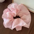 Pink oversized ruched scrunchie with layered frill edges on wooden surface - Multi-layer Pleated Texture / Pink