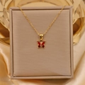 Detail of 18K gold titanium steel necklace with a red zircon butterfly pendant on silk - Red N-127