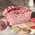 Quilted pink floral cosmetic bag with ruffle detail and red gingham lining for travel - Pink Lace Floral