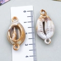 Detailed size view of beige marble acrylic shell pendants for DIY jewelry with ruler - Cream Acrylic Double Hole Conch 30x16x8mm (23598)
