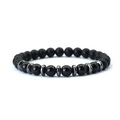 Detail of matte and polished black beads bracelet with metallic disk spacers for men - 8 mm / Matte Black + Polished Stone