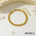 Detail of gold chain bracelet with V-shaped links and lobster clasp on white fabric - Leaf Splicing Style (BR1896-S)